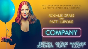 Lead facing the camera and holding a balloon